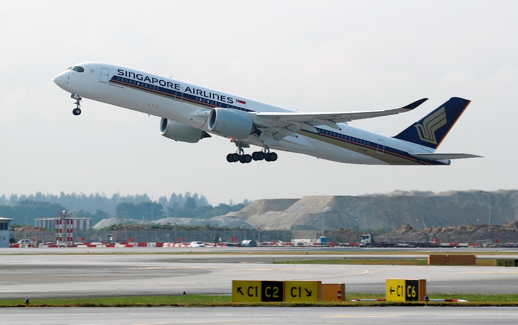 A Singapore Airlines Airbus A350-900 plane takes off at Changi Airport in Singapore March 28, 2018. REUTERS/Edgar Su/File Photo