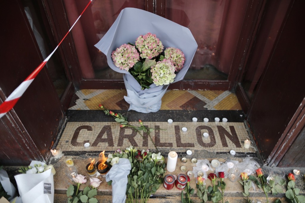 Flowers on the doorstep of Le Carillon restaurant the morning after a series of deadly attacks in Paris.