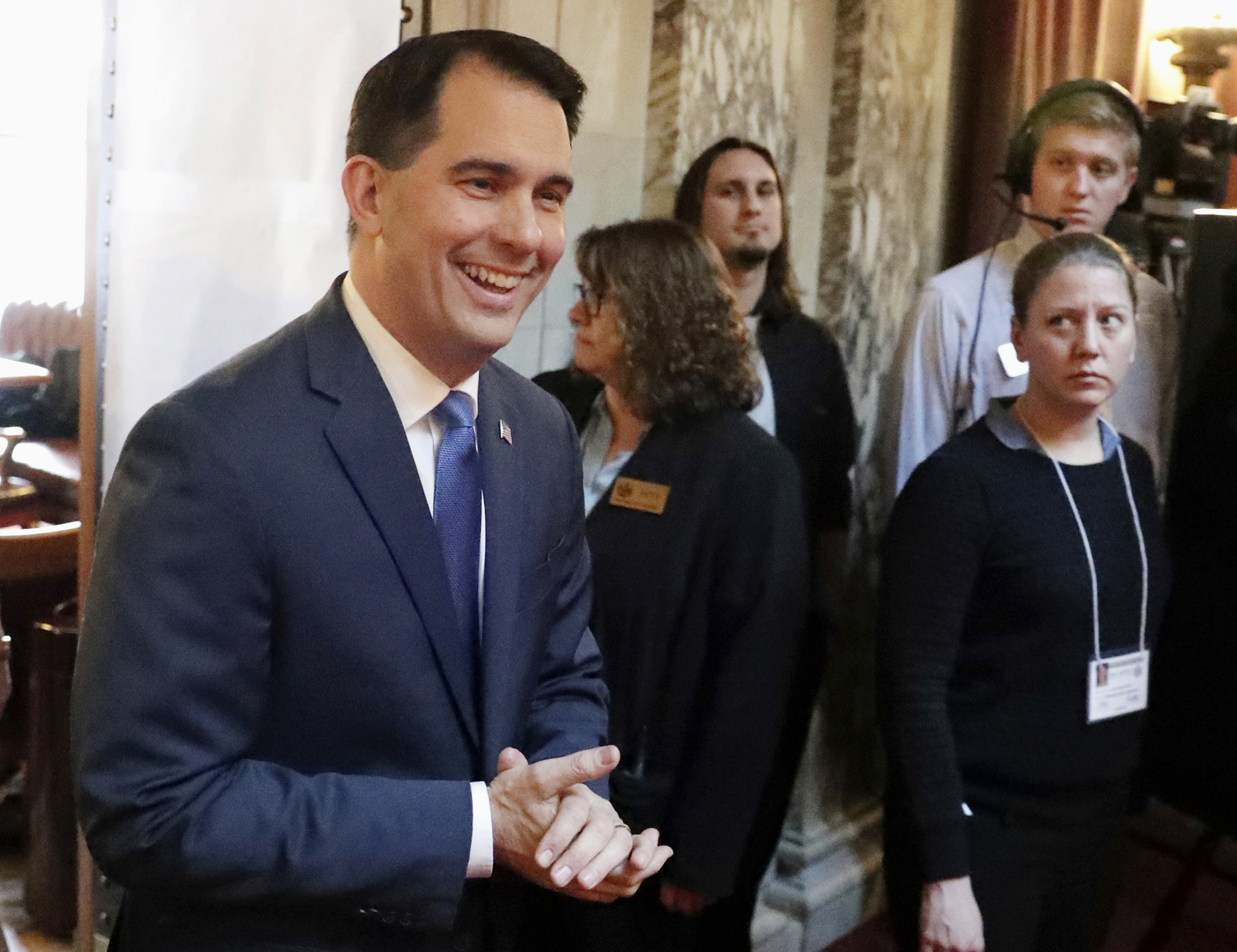 Wisconsin's Walker tries to alter conversation amid bad news