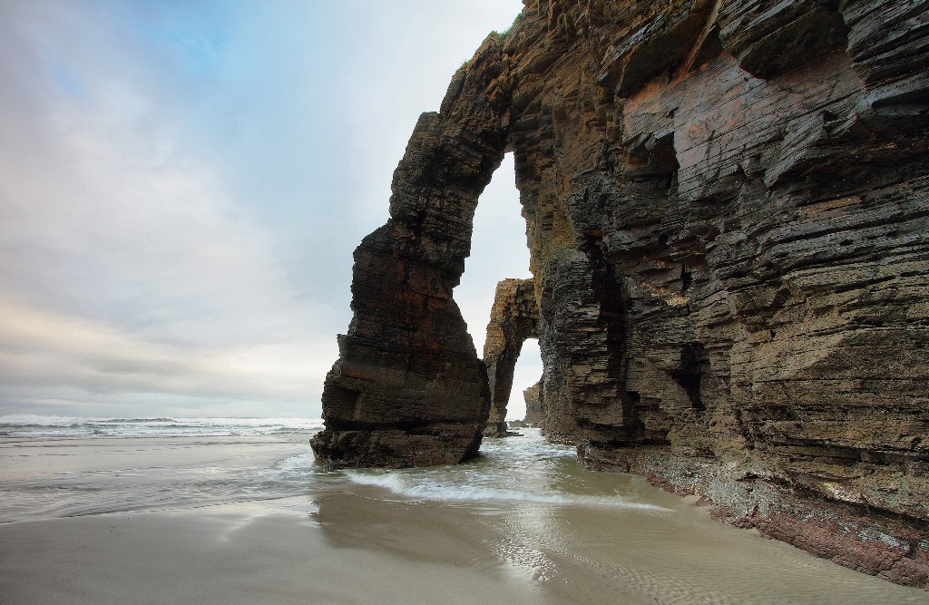 The rock formations that give Cathedrals Beach its name in Ribadeo, Spain. Image: Estivillml, Getty Images