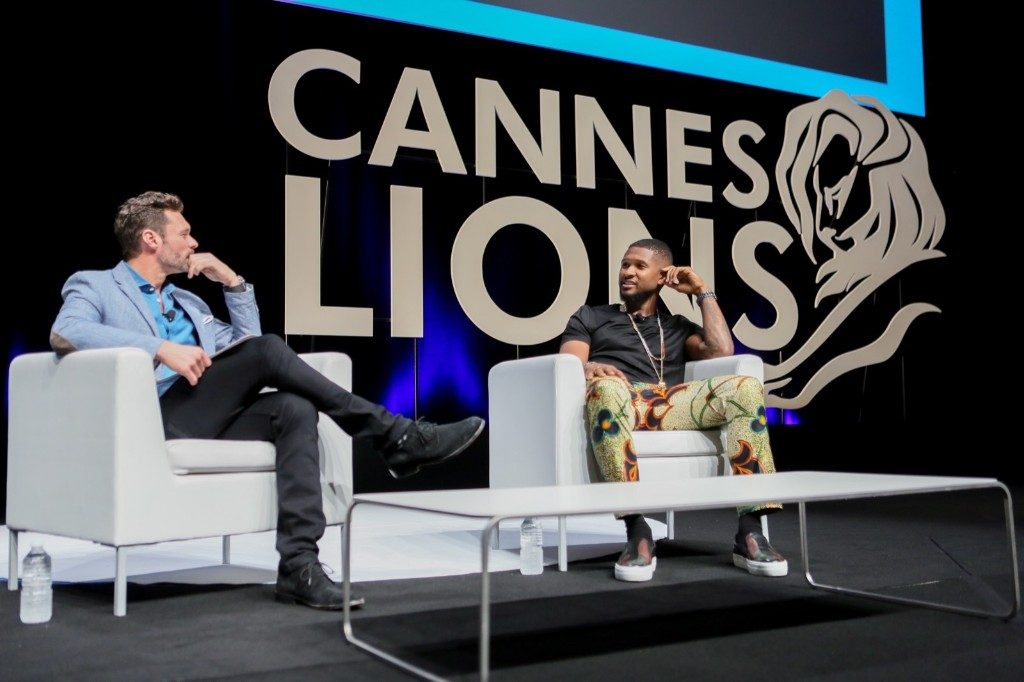 Ryan Seacrest in a fireside chat with Usher on the main stage at Cannes Lions. Tony Barson/Getty Images for iHeartMedia