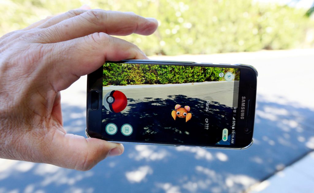 The augmented reality mobile game "Pokemon Go" by Nintendo is shown on a smartphone screen in this photo illustration taken in Palm Springs, California U.S. July 11, 2016. REUTERS/Sam Mircovich/Illustration