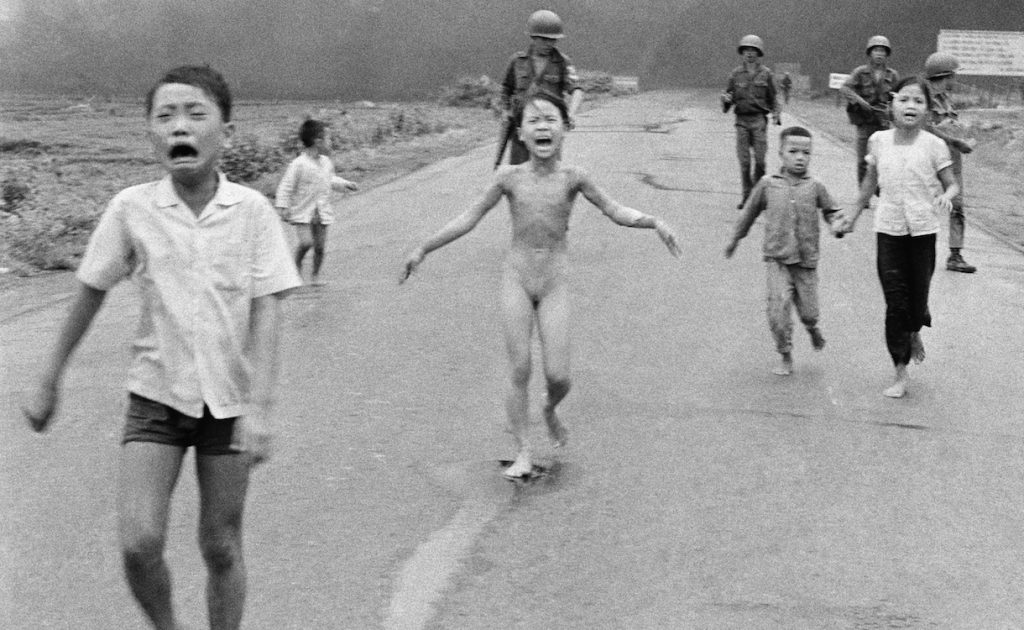 FILE - This is a June 8, 1972 file photo of South Vietnamese forces follow after terrified children, including 9-year-old Kim Phuc, center, as they run down Route 1 near Trang Bang after an aerial napalm attack on suspected Viet Cong hiding places . Norway's Prime Minister Erna Solberg on Friday Sept. 9, 2016 challenged Facebook’s restrictions on nude photos by posting an iconic 1972 image of a naked girl running from an aerial napalm attack in Vietnam. The Pulitzer Prize-winning image by Associated Press photographer Nick Ut is at the center of a heated debate about freedom of speech in Norway after Facebook deleted it from a Norwegian author’s page last month. (AP Photo/Nick Ut, File)