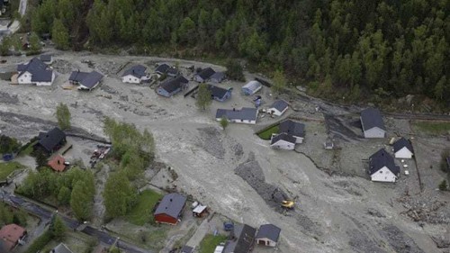Flooding grips Norway
