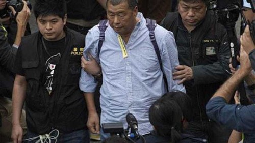 Hong Kong media tycoon resigns after arrest