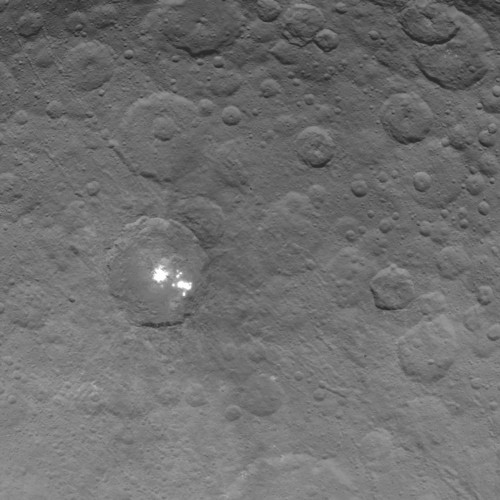Scientists just got the first close-up look at some perplexing white spots in space, and they're more mystified than ever