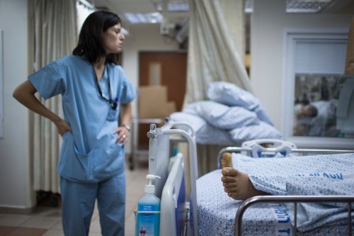 Here's the disturbing psychology of how doctors get through their day