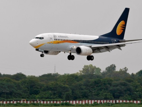 A baby boy born on a flight to India just got free plane tickets for life