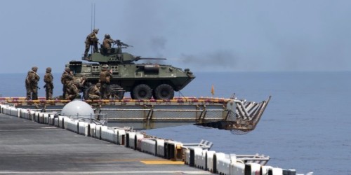 The Marine Corps is strapping armored vehicles to the top of Navy ships to fend off small boats and other threats