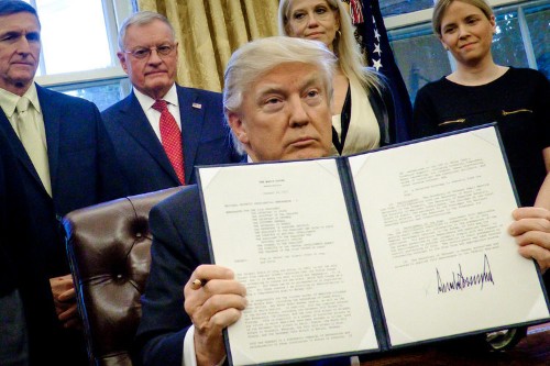 What Trump's executive orders in his first 100 days were actually about