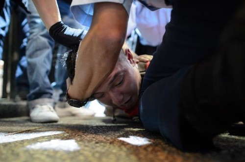 Multiple arrests as Hong Kong demonstrators retake protest camp