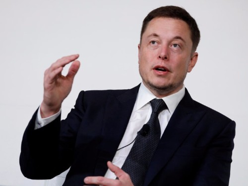 Tesla reports a smaller loss than expected, says Model 3 production is on track to hit targets