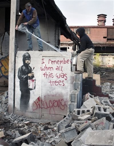 Detroit mural credited to Banksy sells for $137,500