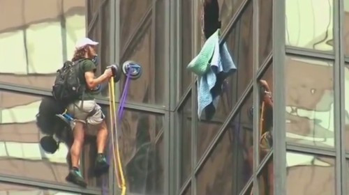 Police grab man climbing Trump Tower in dramatic end to standoff