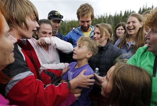 Utah boy survived night in woods by curling up in warm rocks