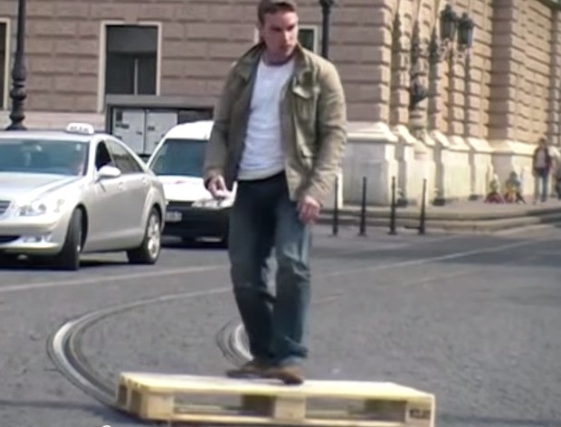 Think You Can Shred? Try Skateboarding a Pallet Down Tram Tracks