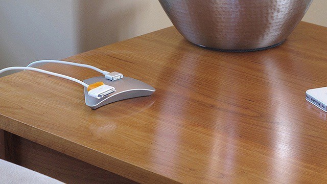 Magnetic Paperweight Wrangles Cables. Cuts Clutter