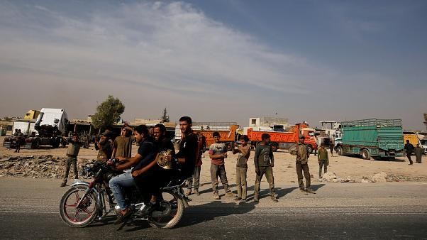'Damascus is looking stronger than ever': What next for Syria as Kurds join forces with Assad?