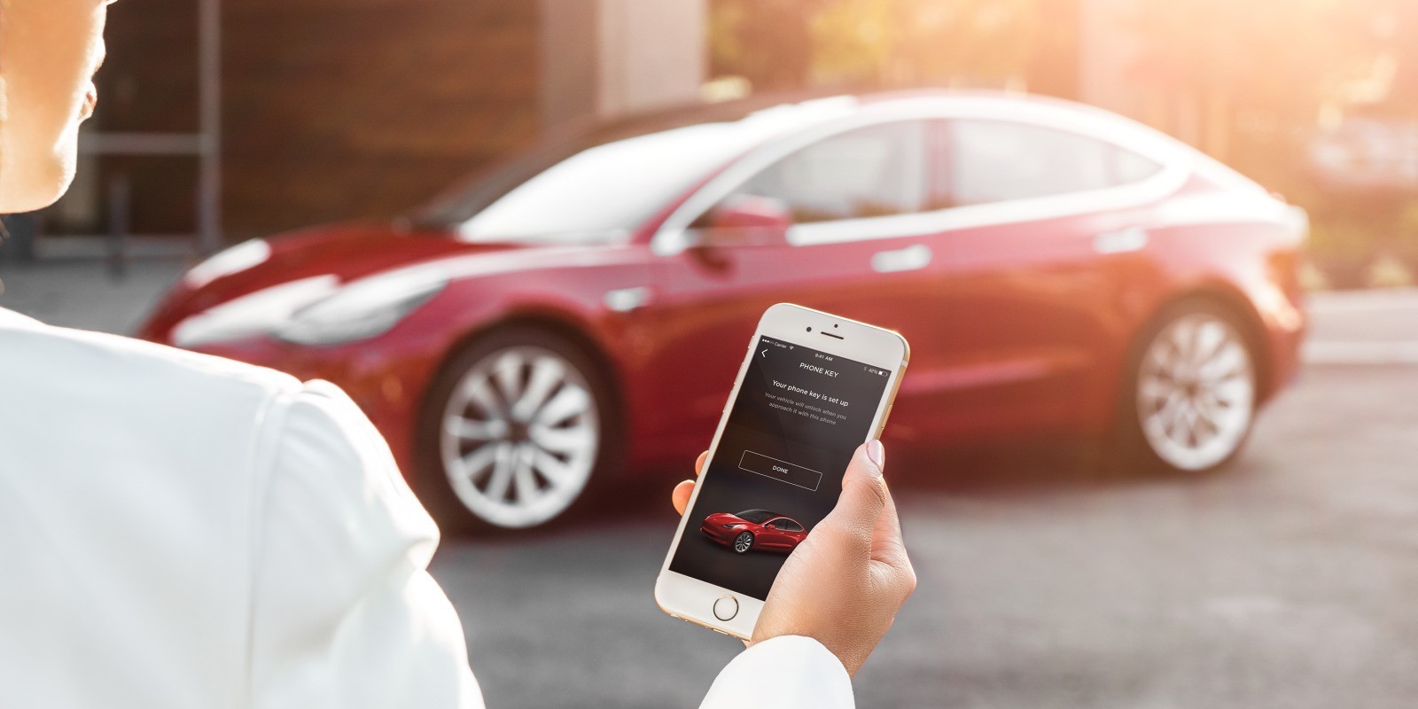 Tesla releases new Model 3 pictures to show its key card and iPhone-based unlocking system