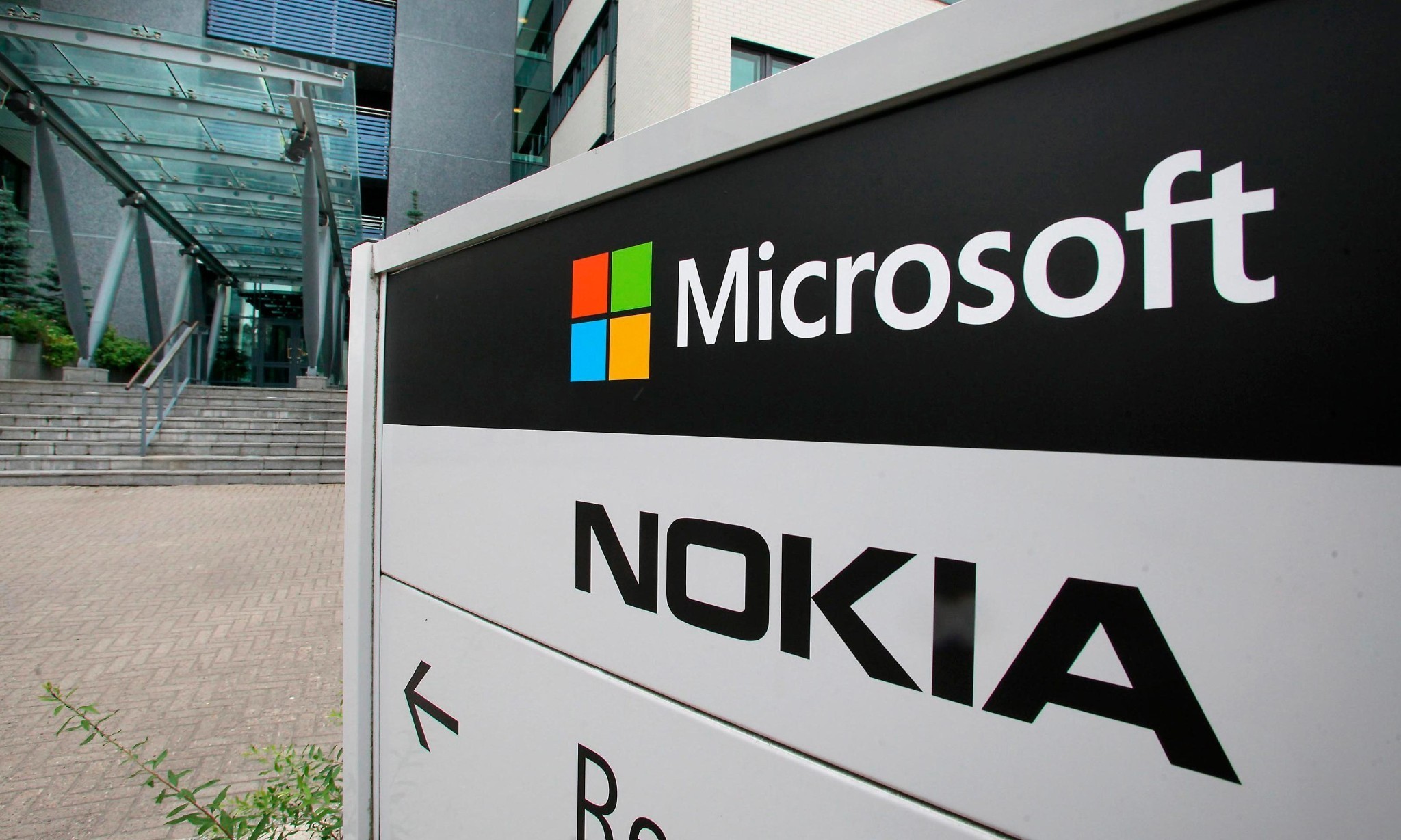 Microsoft to cut 1,850 jobs at struggling former Nokia smartphone unit
