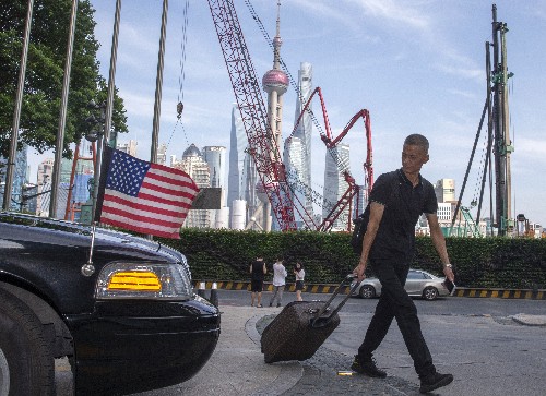 The Latest: Tech group calls for end to US-China trade war