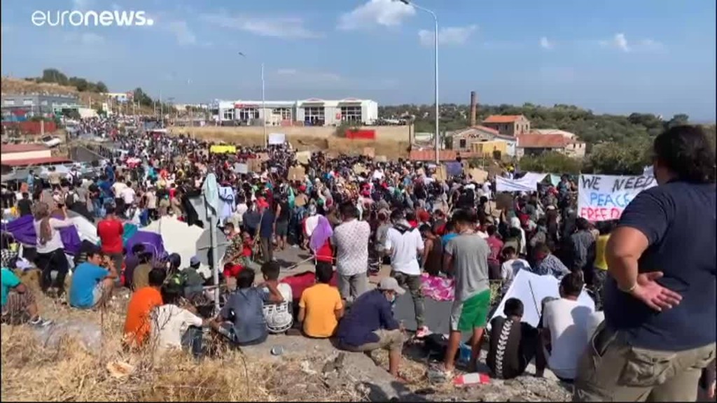 Displaced migrants on Lesbos island protest in wake of fire at Moira camp