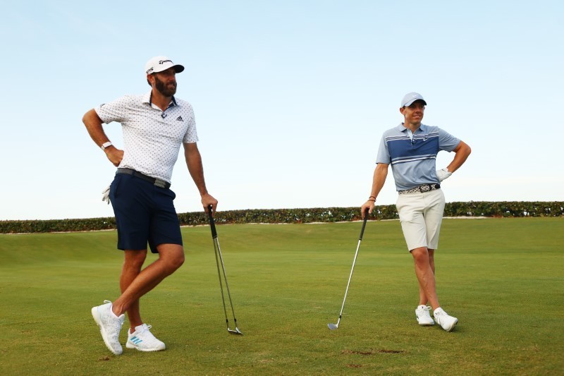 Golf - McIlroy, Johnson triumph as charity match offers 'normalcy'