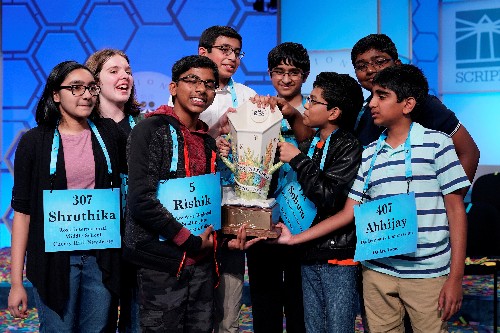 Eight tie in U.S. spelling bee as organizers run out of challenging words
