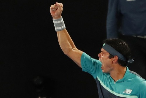 Raonic overcomes Wawrinka in pulsating four-setter