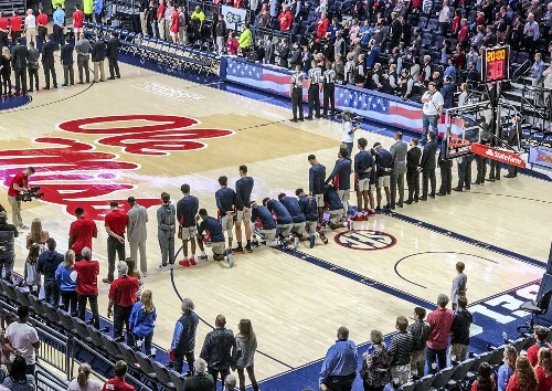 Ole Miss players kneel in response to Confederacy rally
