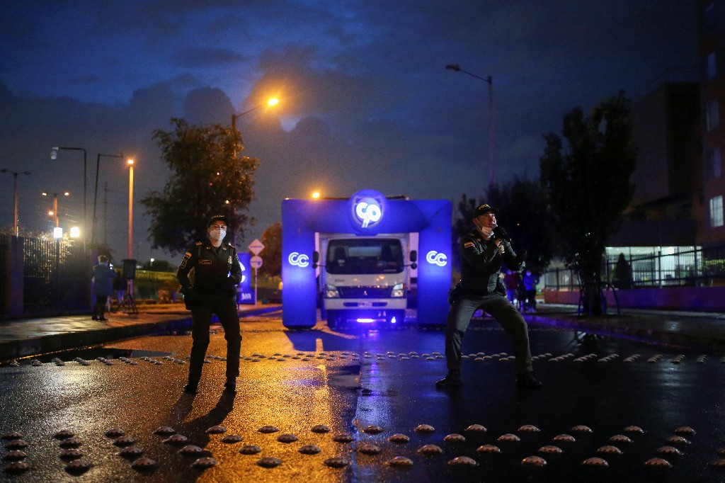 Lights, camera, action! Quarantine-weary Bogota residents watch films from balconies