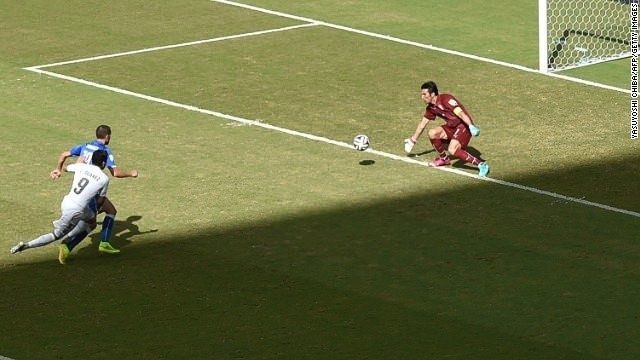 World Cup: Luis Suarez banned for four months