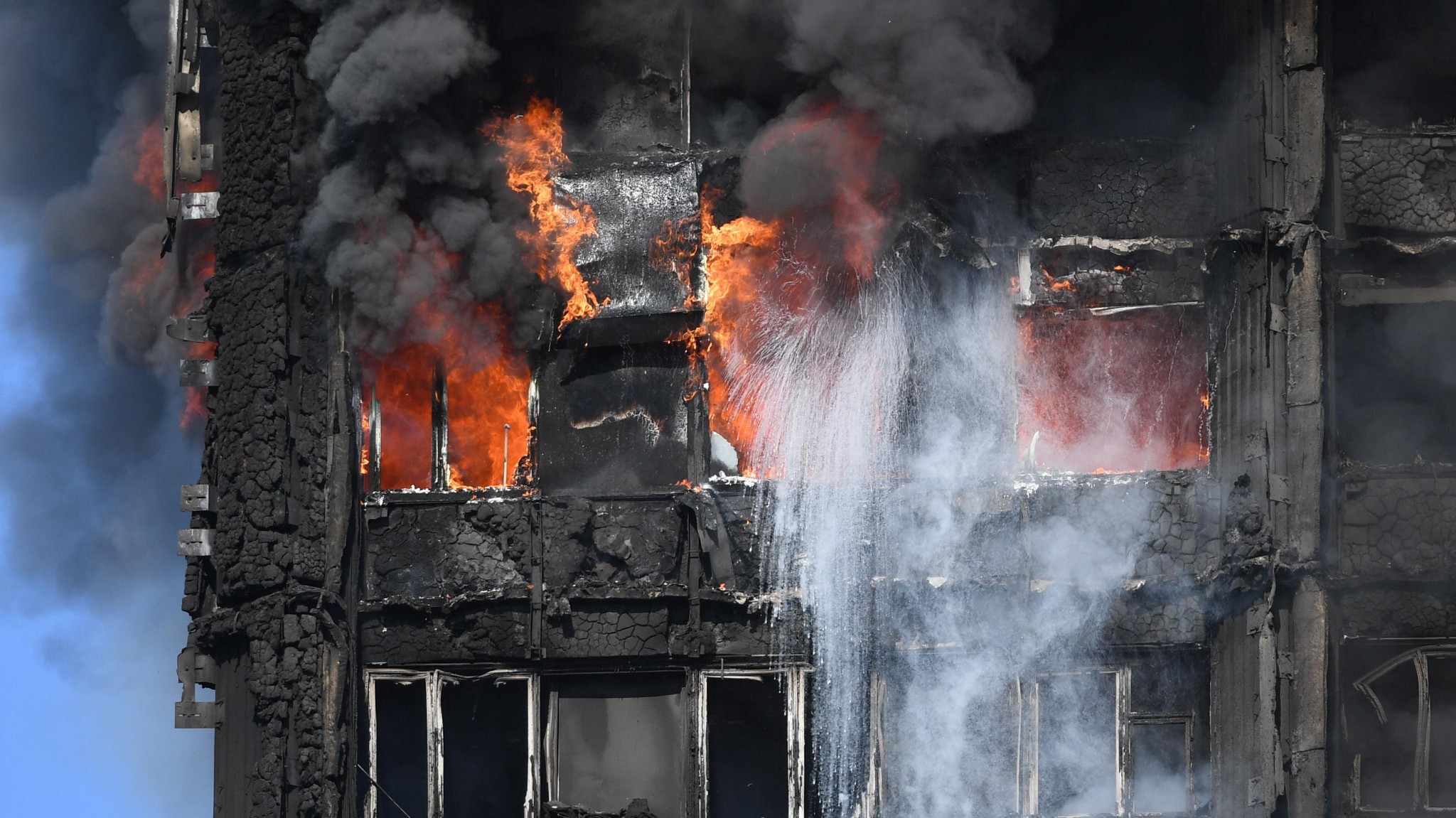 Grenfell Tower: at least six dead as fire destroys 24-storey building