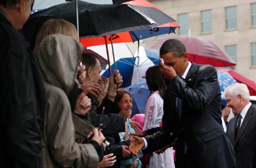 Twitter Pelts Trump With Photos Of Obama In The Rain After He Ditches Cemetery Visit