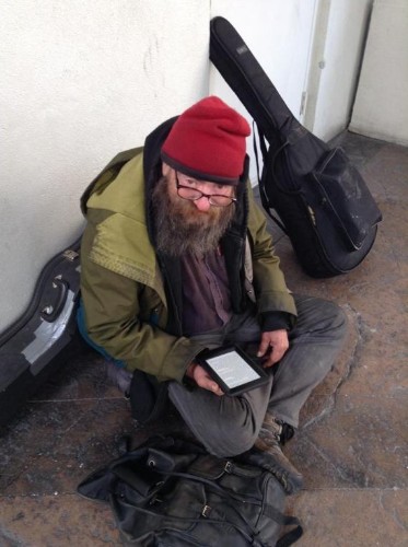 A Homeless Man Read His Only Book Over And Over, So A Compassionate Stranger Gave Him A Kindle