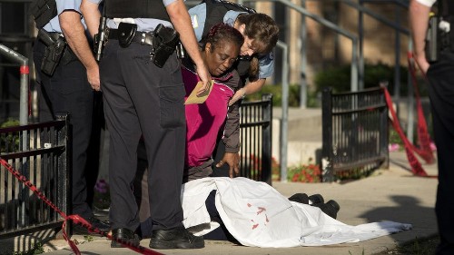 Mother pleads with police at fatal Chicago shooting: 'I need to touch my son'