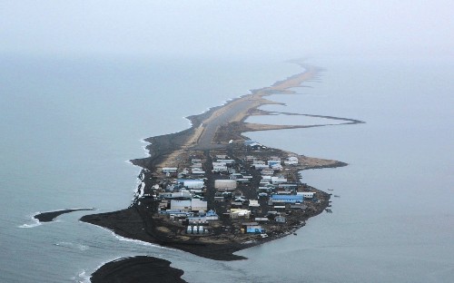 This is climate change: Alaskan villagers struggle as island is chewed up by the sea