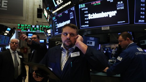 Stocks jump, helped by encouraging economic data
