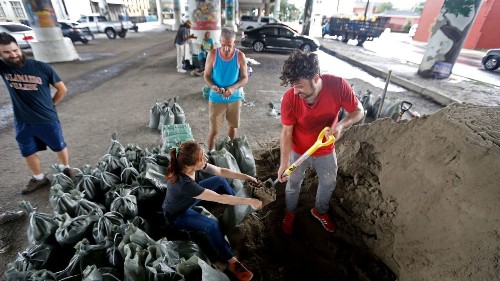 New Orleans braces for new flooding as it copes with power outages, failed pumping system