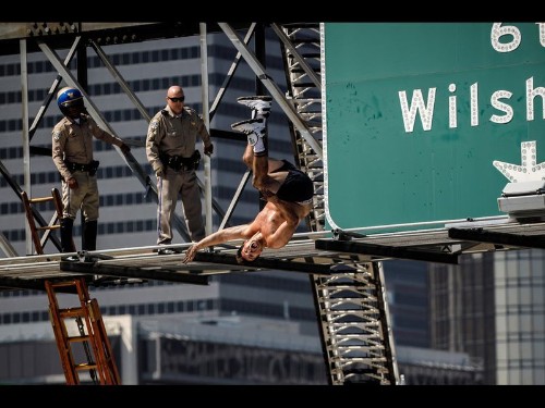 Charges filed against aspiring rapper who scaled traffic sign on 110 Freeway