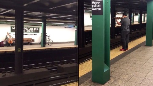 Watch a gorgeous string duet happen across NYC subway tracks