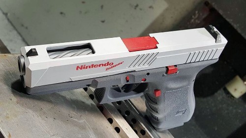 Someone turned a real Glock gun into a clone of the Nintendo 'Duck Hunt' zapper