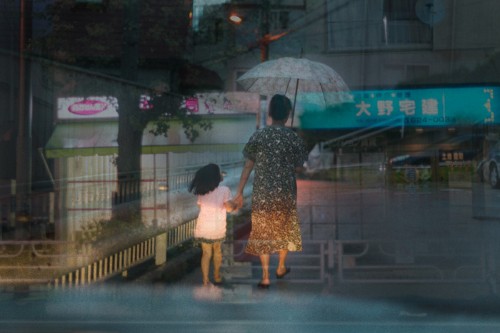 Japanese Taxi Driver Takes Multiple Exposures While Looking for Passengers