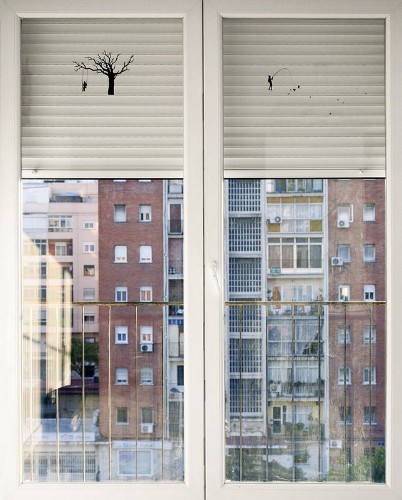 Miniature Silhouetted People Playfully Interact With the Urban Landscape