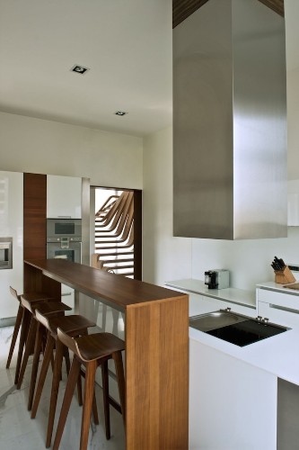 Beautifully Sloping Wooden Staircase Creates a Sense of Flow in the Home