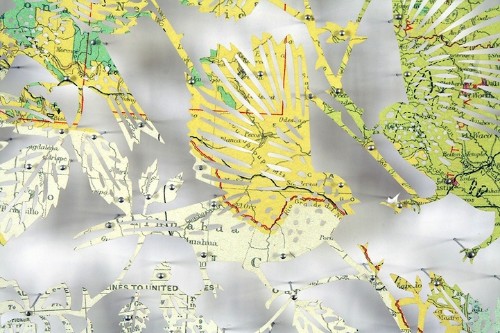 Intricately Carved Nature Scenes Emerge From Old Paper Maps