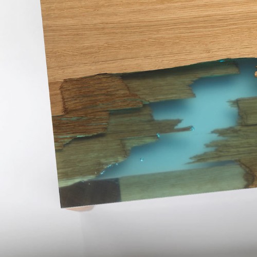 Eco-Friendly Furniture Uses Glowing Bio Resin to "Self Heal" Salvaged Wood