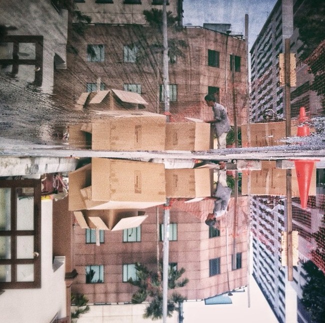 Creative Snapshots Reveal Singapore’s Urban Landscape Reflected in Puddles