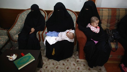 A new law in China may make it illegal for men to force women to wear a burqa