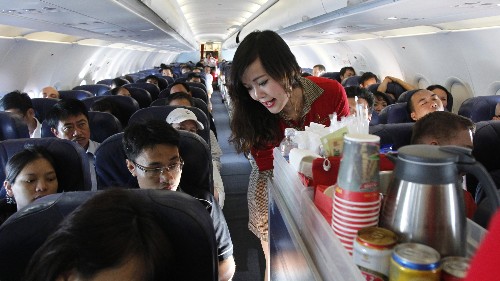If the passenger in the seat next to you buys a snack or a movie, you probably will too